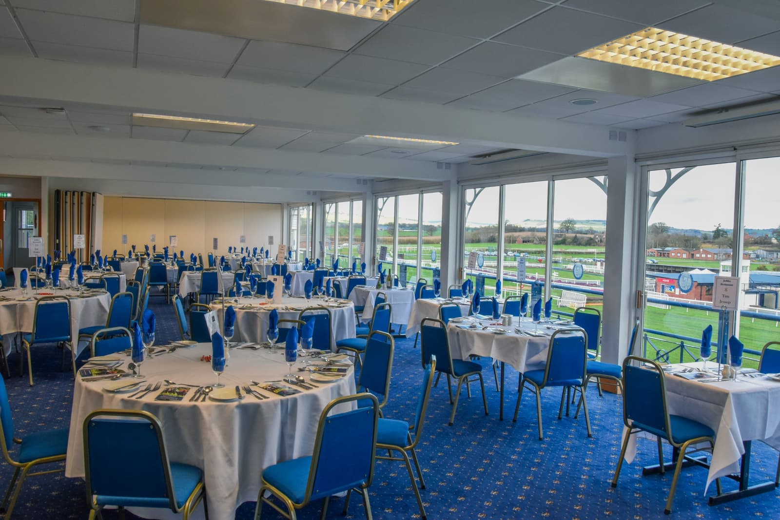 A restaurant laid for a raceday, overlooking the course at Ludlow